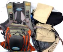 ACCESSORIES: (2) Fishpond combination chest and back pack multi pocket system with inbuilt fly