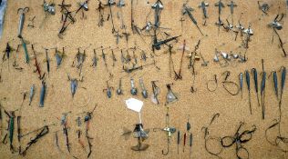 LURE DISPLAY: Large collection of vintage bait mounts, leaded spinners, hooks to gimp wire, leaded