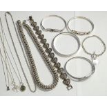 SELECTION OF SILVER JEWELLERY comprising four bangles,