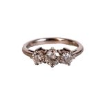 DIAMOND THREE STONE RING set in platinum, the diamonds totalling approximately 1.