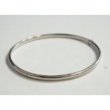 EIGHTEEN CARAT WHITE GOLD BANGLE approximately 5.