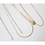 SMALL LOT OF NINE CARAT GOLD JEWELLERY comprising a coffee bean pendant and four neck chains,