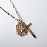 NINE CARAT GOLD CROSS PENDANT on nine carat gold belcher link chain,