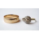 TWO NINE CARAT GOLD RINGS comprising a diamond set cluster ring,