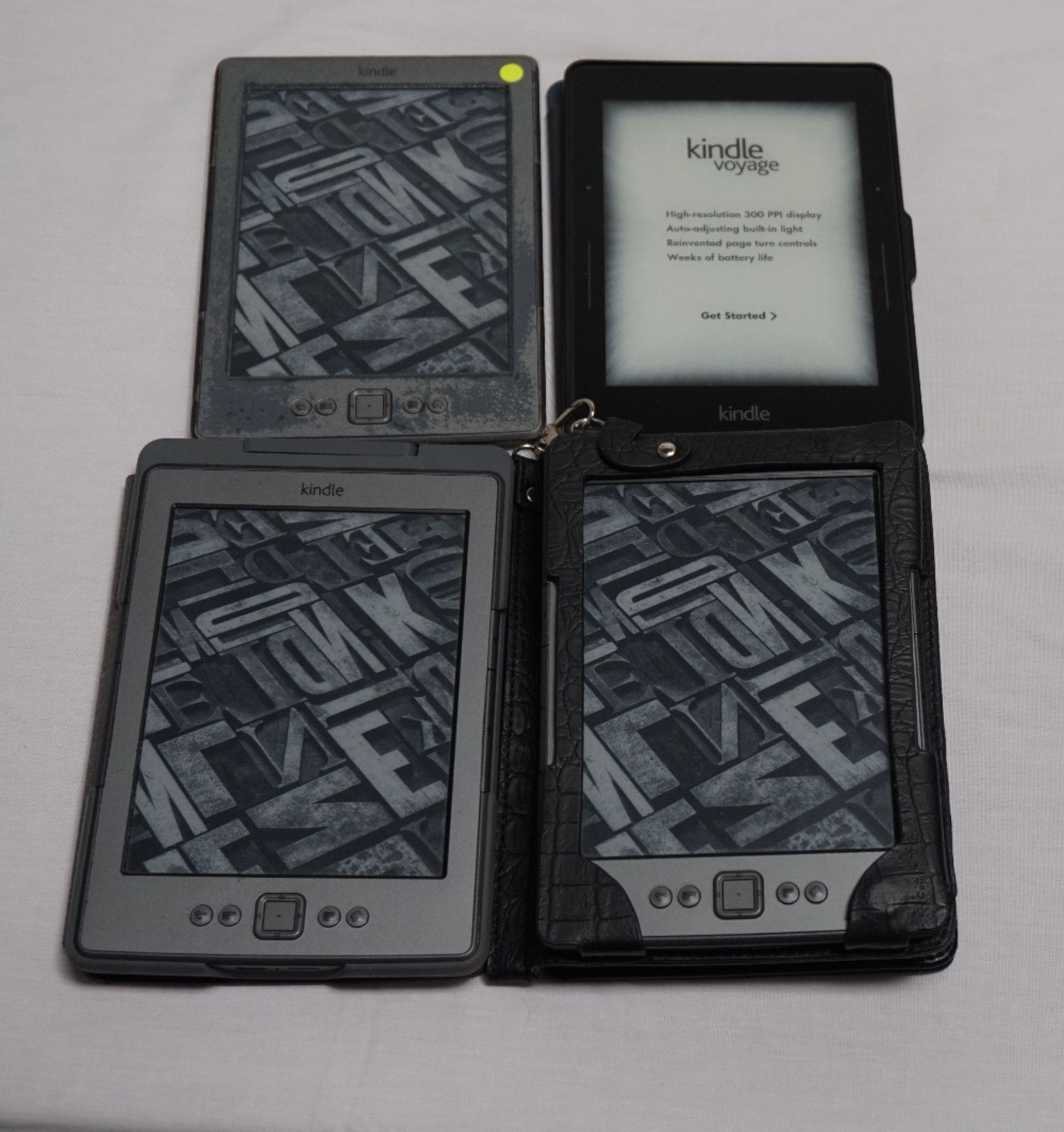 FOUR KINDLE DEVICES