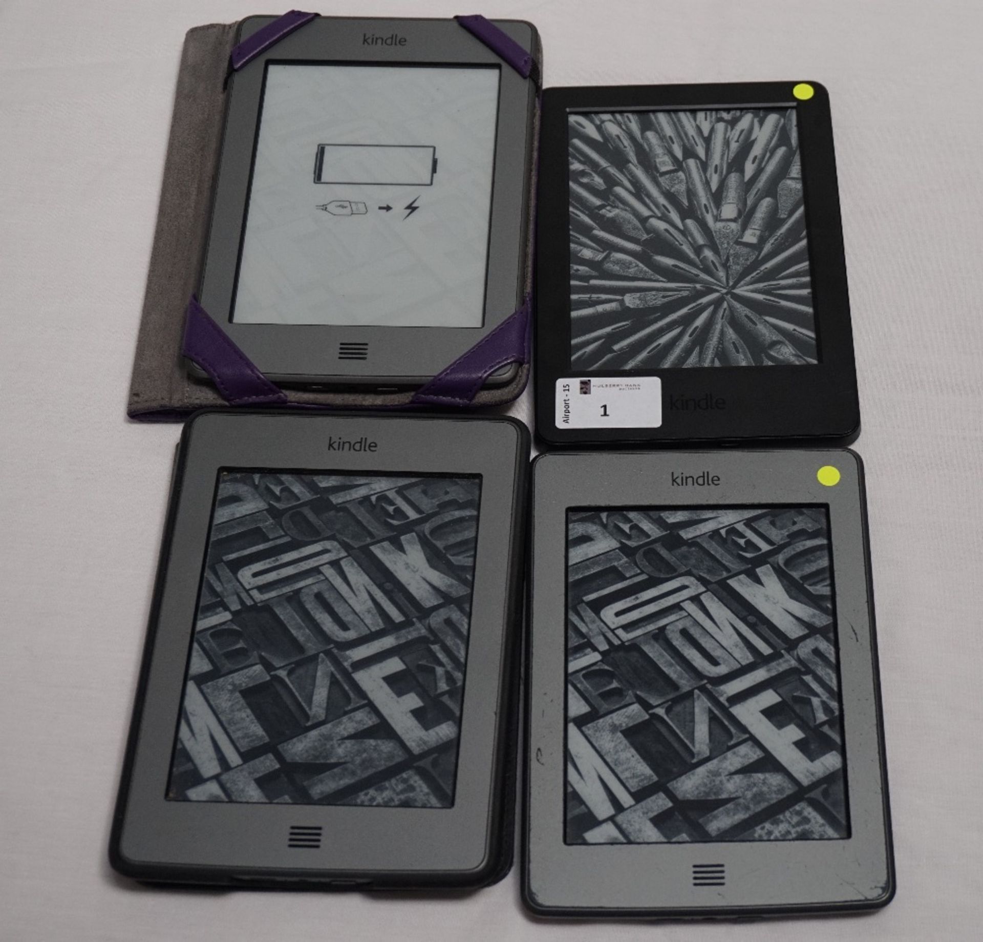 FOUR KINDLE DEVICES