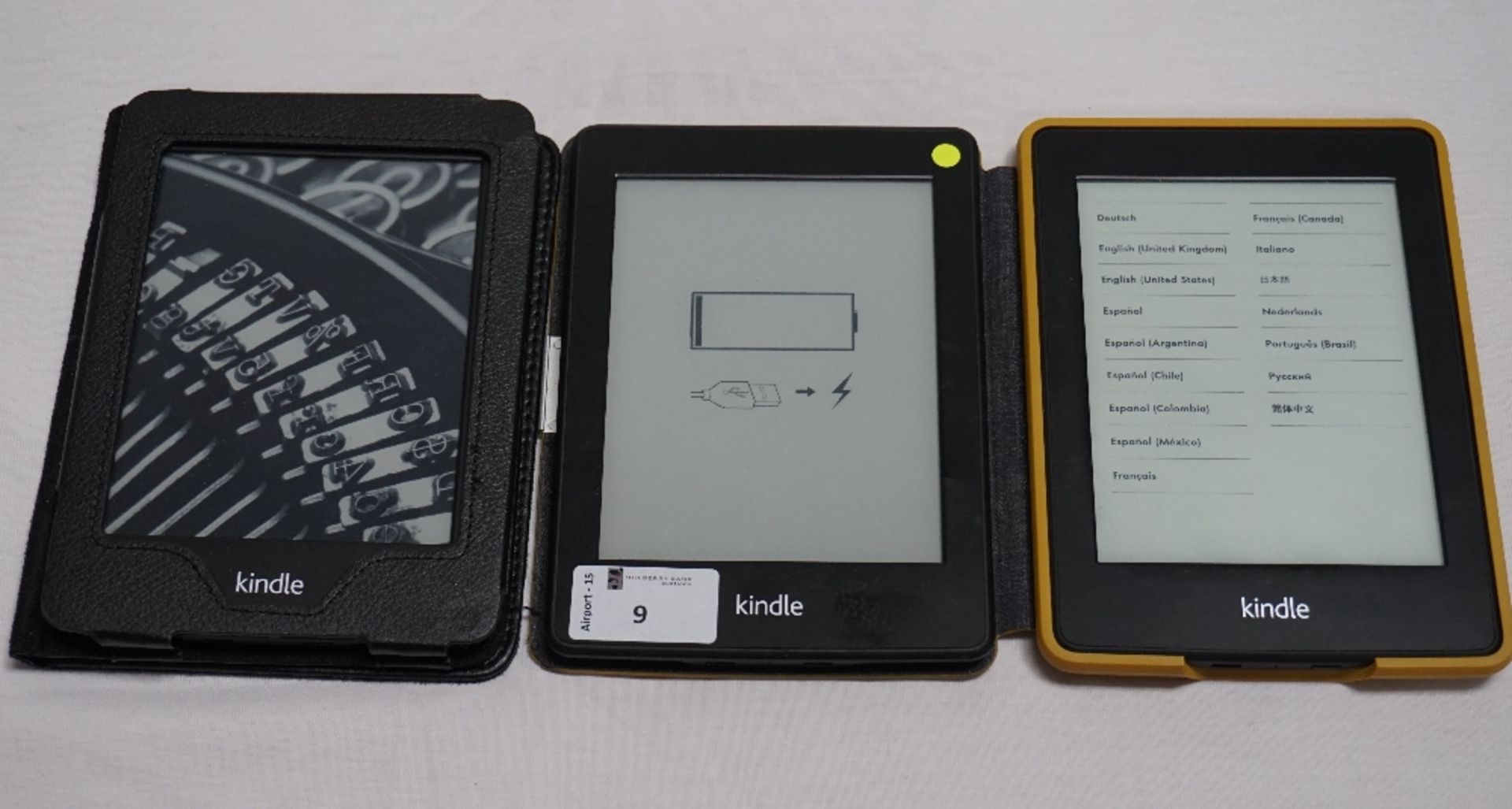 THREE KINDLE PAPERWHITE DEVICES