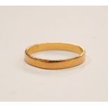 TWENTY-TWO CARAT GOLD WEDDING BAND ring size J-K and approximately 1.