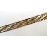 NINE CARAT THREE TONE GOLD LINK BRACELET with clip fitment, approximately 21.