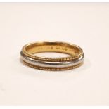 EIGHTEEN CARAT GOLD AND PLATINUM WEDDING BAND ring size K-L