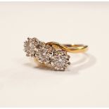 DIAMOND THREE STONE RING on nine carat gold shank, the diamonds totalling approximately 0.