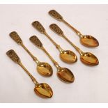 SET OF SIX RUSSIAN SILVER GILT TEASPOONS all with niello decoration to the finials and exterior