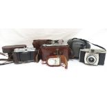 SELECTION OF CAMERAS including a Balda folding camera, cased; a Voigkandier Vito II folding camera,