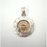 EIGHTEEN CARAT TWO TONE GOLD LEO ZODIAC SIGN PENDANT the central sun surrounded by the twelve