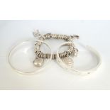 THREE SILVER BRACELETS comprising a Links of London Sweetie bracelet with five charms including a