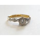 DIAMOND SOLITAIRE RING in eighteen carat gold and platinum, the diamond approximately 0.