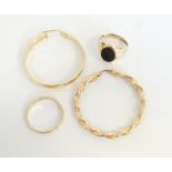 SELECTION OF GOLD JEWELLERY comprising a nine carat gold wedding band,