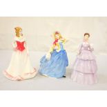 THREE ROYAL DOULTON FIGURINES Autumn Breezes, HN3736, 19.5cm high; Sincerity, 19.