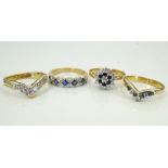 FOUR GEM SET SILVER GILT RINGS of various design,