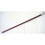 DOG'S HEAD WALKING CANE the head in white metal, with stained wooden shaft, 94.