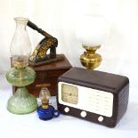 GREEN GLASS OIL LAMP with a moulded glass body, 45cm high,