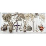SELECTION OF SILVER PENDANTS AND CHAINS including a whistle pendant, an amethyst set cross pendant,