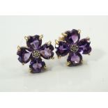 PAIR OF AMETHYST AND DIAMOND STUD EARRINGS in the form of four leaf clovers,