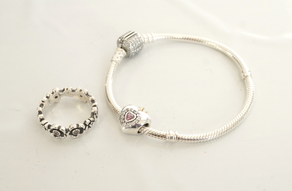 PANDORA SILVER CHARM BRACELET with a heart shaped charm;