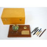 ROLLS ROYCE (BRASIL) INTEREST a desk set with fitted box made from native Brazilian hardwoods,