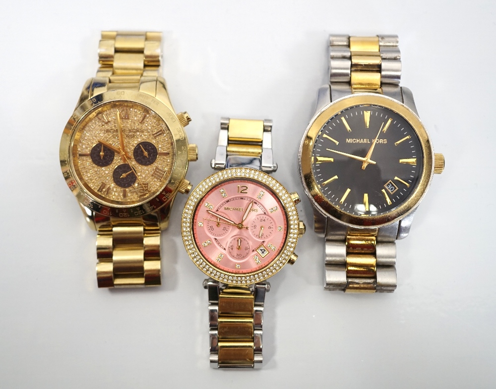 THREE MICHAEL KORS WRISTWATCHES comprising two gentlemen's watches (numbers 5830 and 7064) and one