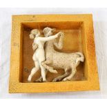 UNUSUAL POTTERY WALL PLAQUE depicting Lapith woman dancing with a Centaur in relief within deep