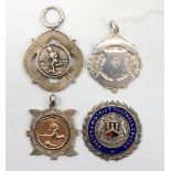 FOUR SILVER FOOTBALL MEDALS comprising one with gold detail engraved to reverse 'Cowcaddens Star