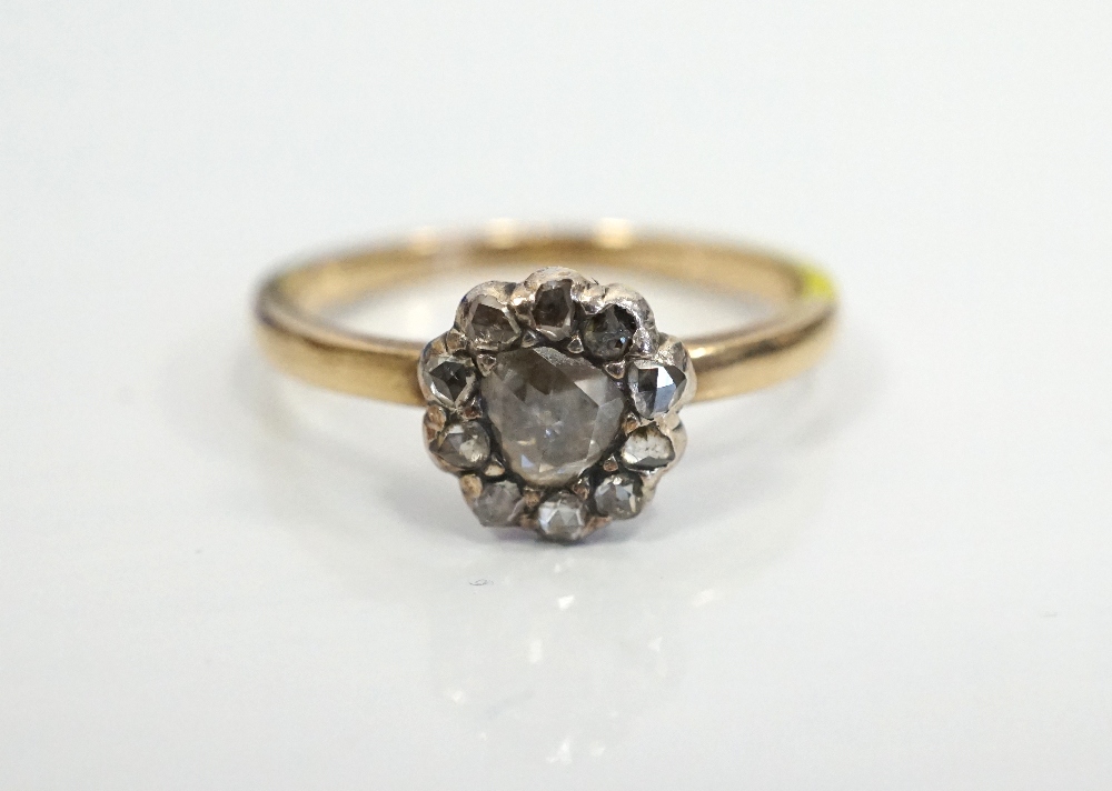 OLD ROSE CUT DIAMOND CLUSTER RING on unmarked gold shank,