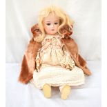 GERMAN BISQUE HEAD DOLL early 20th century, with sleeping eyes and open mouth,
