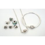 SELECTION OF PANDORA SILVER JEWELLERY comprising a bangle with heart clasp,