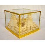 ASIAN BALSA WOOD MODEL OF A TEMPLE possibly Hindu, in glazed case, the case size 23.5cm high x 30.