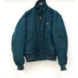 OFFICIAL JAMES BOND GOLDENEYE CREW JACKET in green with two pockets and a zipped arm pocket,