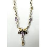 GEM SET SILVER NECKLET the front pendant section set with amethyst, citrine and smoky quartz,