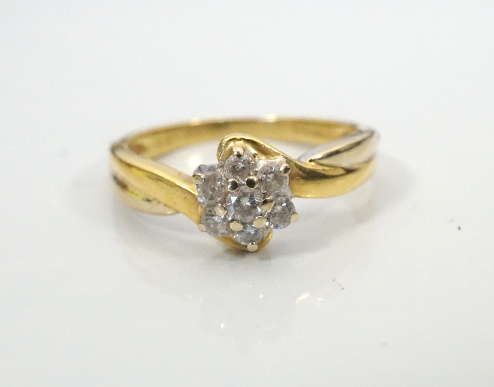 DIAMOND CLUSTER RING the diamonds totalling approximately 0.