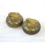 PAIR OF DECORATIVE SMALL GRANITE CURLING STONES with shaped brass handles, 7.