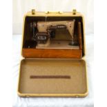 VINTAGE 'SINGER' PORTABLE SEWING MACHINE numbered 'EL819890', with accessories,