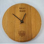 OAK WALL CLOCK BY ALL THINGS WOOD formed from the end of an Islay whisky barrel, 39.