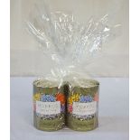 PAIR OF SCENTED CANDLES BY MOBROS with black pepper scent and black raspberry and vanilla scent,