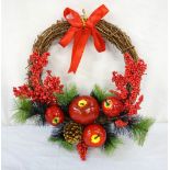 ARTIFICIAL CHRISTMAS WREATH the twig ring decorated with pine sprigs, apples,