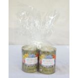 PAIR OF SCENTED CANDLES BY MOBROS with wild bluebell scent and plum blossom scent,