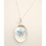 OVAL FORGET ME NOT PENDANT BY BOTANIC ISLES the hand pressed flower from the Isle of Arran