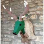 GREEN HARRIS TWEED FAUX TAXIDERMY STAG HEAD BY JULIET LEDSON the head with false eyelashes and faux