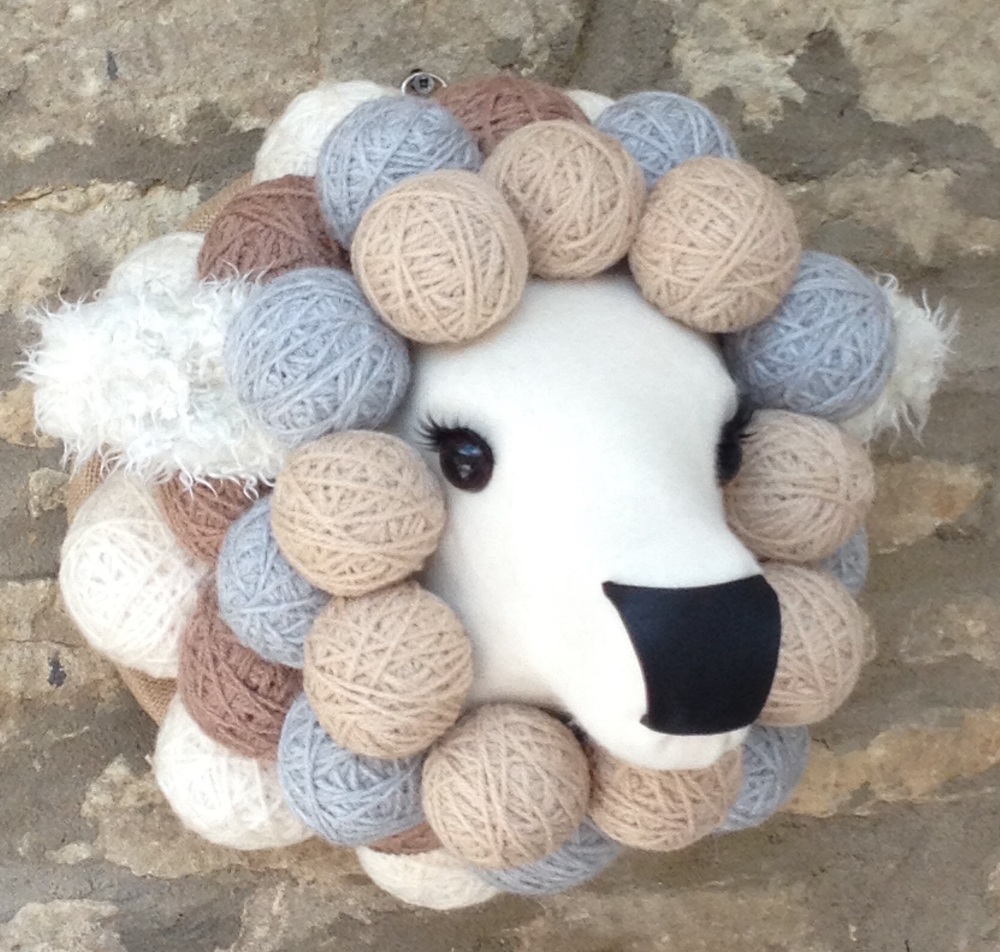 FABRIC AND WOOL FAUX TAXIDERMY LAMB HEAD BY JULIET LEDSON the head with false eyelashes,