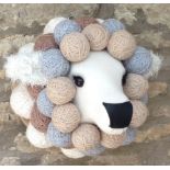 FABRIC AND WOOL FAUX TAXIDERMY LAMB HEAD BY JULIET LEDSON the head with false eyelashes,