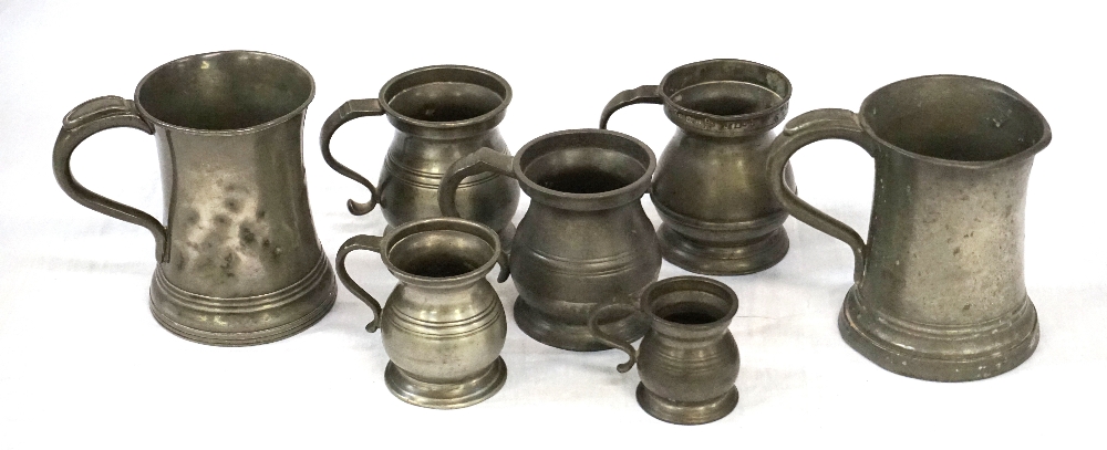 SEVEN VARIOUS PEWTER TANKARDS